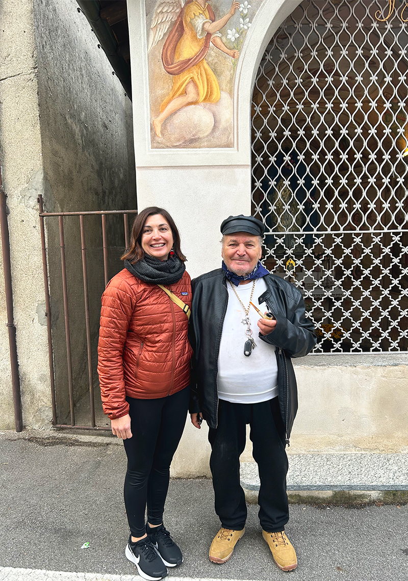 Esthter Pearl Watson and her father standing beneath an angel